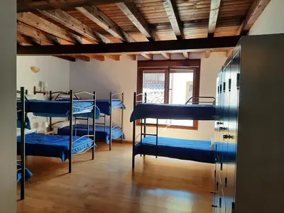 Cama o camas de una habitación en La Casa de Mi Abuela