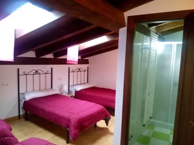 Cama o camas de una habitación en La Casa de Mi Abuela