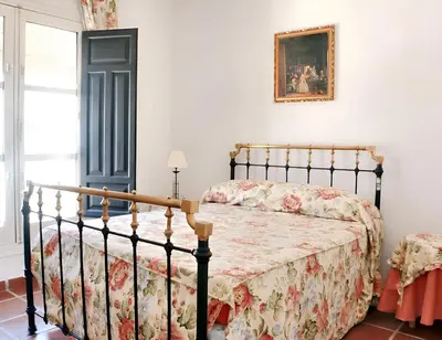 Cama o camas de una habitación en Charming House in Castilblanco with Terrace and Fireplace