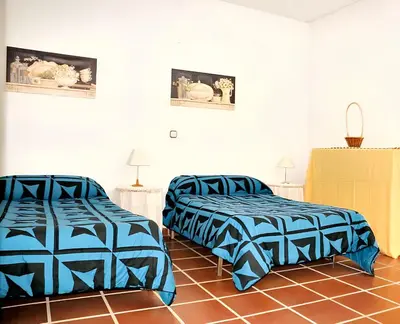 Cama o camas de una habitación en Charming House in Castilblanco with Terrace and Fireplace