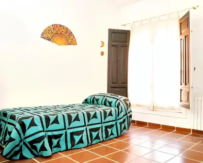 Cama o camas de una habitación en Charming House in Castilblanco with Terrace and Fireplace