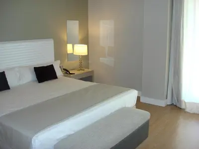 Cama o camas de una habitación en Vincci Valdecañas Golf