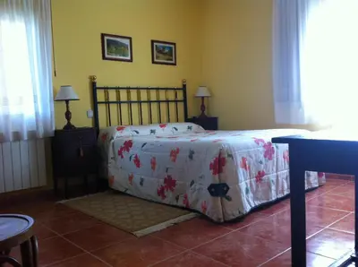 Cama o camas de una habitación en Casa Rural Sierra de Tormantos