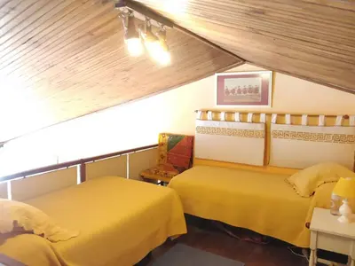 Cama o camas de una habitación en El Altillo