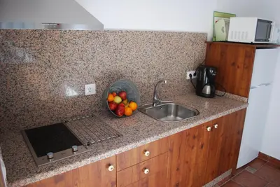 Una cocina o zona de cocina en Apartamentos Rurales el Trillo