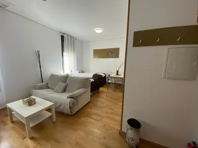 Zona de estar de Apartamentos Caceres