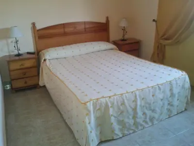Cama o camas de una habitación en Hostal Alameda