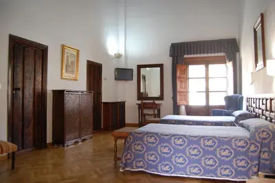 Cama o camas de una habitación en Hospederia del Real Monasterio