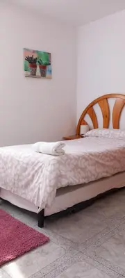 Cama o camas de una habitación en El Mirador