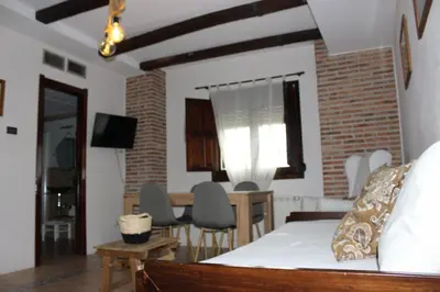 Una televisión o centro de entretenimiento en Apartamentos de Astroturismo la Cañada