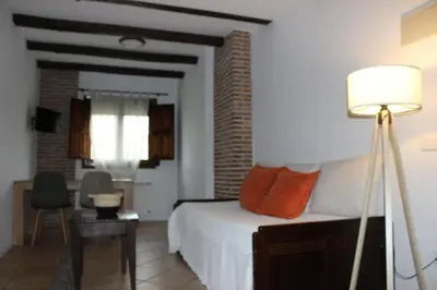Cama o camas de una habitación en Apartamentos de Astroturismo la Cañada