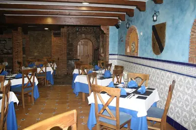 Un restaurante o sitio para comer en Hotel Carvajal