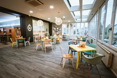 Un restaurante o sitio para comer en Hotel Spa Sinagoga