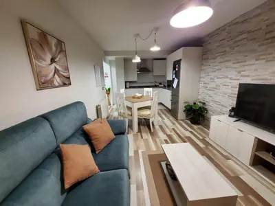 Una televisión o centro de entretenimiento en Alojamiento en Villamayor