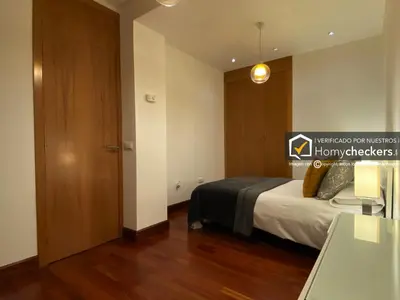 Cama o camas de una habitación en HomyAT Prior Romo, Plaza Mayor