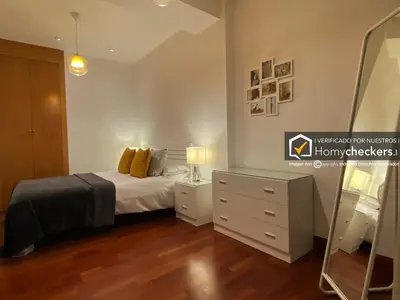 Cama o camas de una habitación en HomyAT Prior Romo, Plaza Mayor
