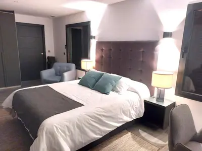 Cama o camas de una habitación en Plasencia Plaza Mayor Luxury