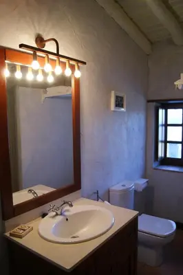 Un baño de Apartamentos Rurales Escobar & Jerez