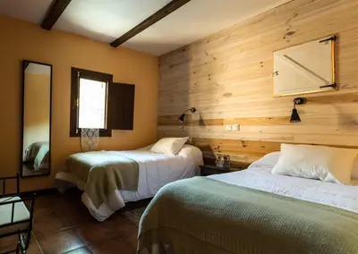 Cama o camas de una habitación en Hotel Rural Don Burguillo