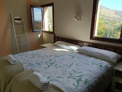 Cama o camas de una habitación en Hotel Rural Don Burguillo