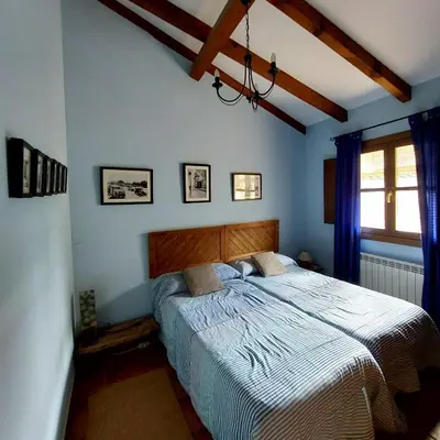 Cama o camas de una habitación en Casa Rural Abuela Reme