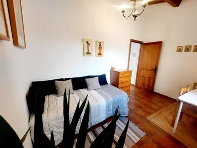 Cama o camas de una habitación en Casa Rural Abuela Reme