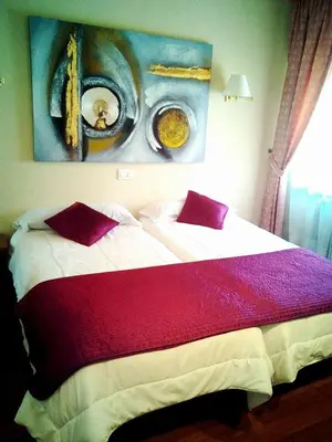 Cama o camas de una habitación en Hotel San Antonio