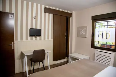 Cama o camas de una habitación en Hostal Gud Salamanca