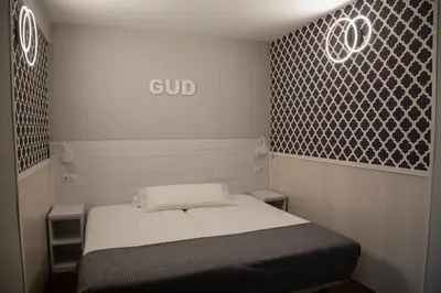 Cama o camas de una habitación en Hostal Gud Salamanca