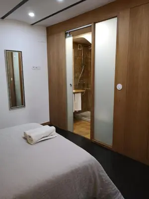 Cama o camas de una habitación en Apartamentos 14DeSande