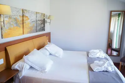 Cama o camas de una habitación en Salugral Termal Resort