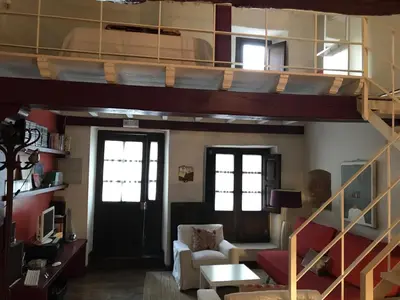 Zona de estar de Apartamento loft la casa de las Pajaritas