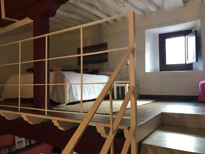 Cama o camas de una habitación en Apartamento loft la casa de las Pajaritas