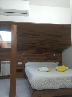 Cama o camas de una habitación en Bejar Alojamiento La Plaza