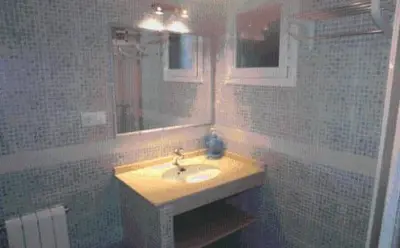 Un baño de Alojamiento rural la Bellosina