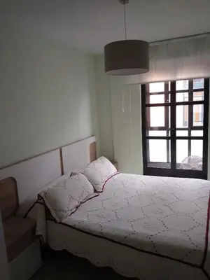 Cama o camas de una habitación en San Juan de la Cruz con garaje incluido