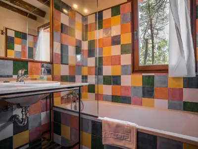 Un baño de Lo Alto