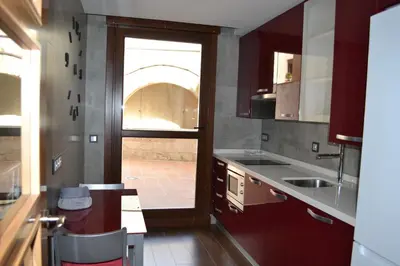 Una cocina o zona de cocina en Apartamentos Suites&Homes