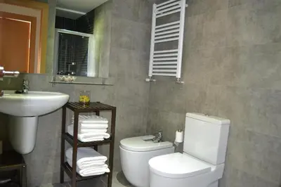 Un baño de Apartamentos Suites&Homes