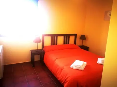 Cama o camas de una habitación en Casa Rural Grajos I