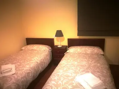 Cama o camas de una habitación en Casa Rural Grajos I