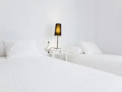 Cama o camas de una habitación en Casa Babel Monfragüe