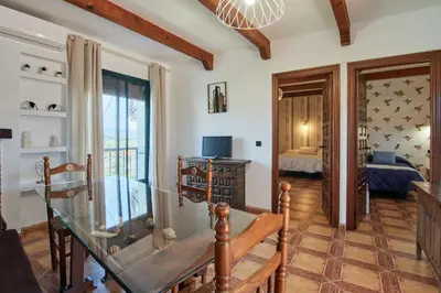 Cama o camas de una habitación en Apartamentos La Solana de Monfragüe