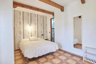 Cama o camas de una habitación en Apartamentos La Solana de Monfragüe