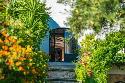Jardín al aire libre en Apartamentos La Solana de Monfragüe