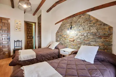 Cama o camas de una habitación en Apartamentos La Solana de Monfragüe