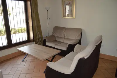 Zona de estar de Apartamentos Turísticos - Hostal Los Alisos