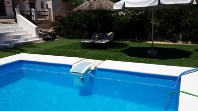 Piscina en o cerca de Apartamentos Turísticos - Hostal Los Alisos
