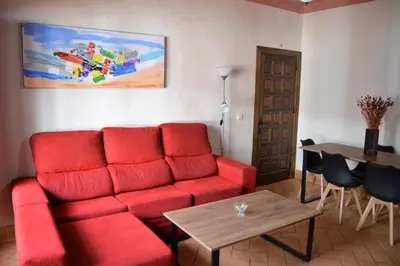 Zona de estar de Apartamentos Turísticos - Hostal Los Alisos