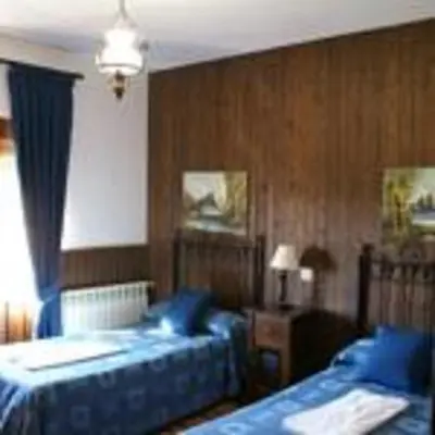 Cama o camas de una habitación en Casa Rural Peña Falcón